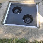 StormExx filter insert installed in a storm drain