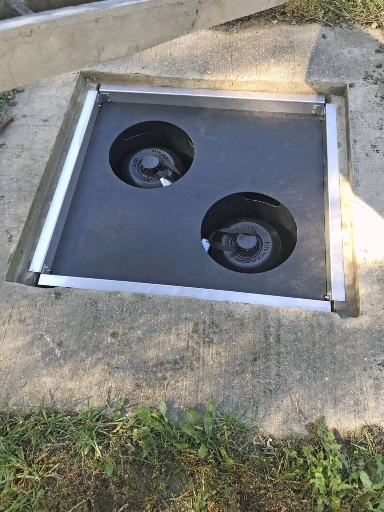 StormExx filter insert installed in a storm drain