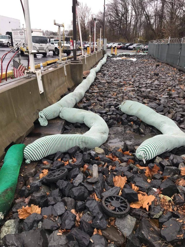 EnviroSoxx pollutant filter socks installed over riprap