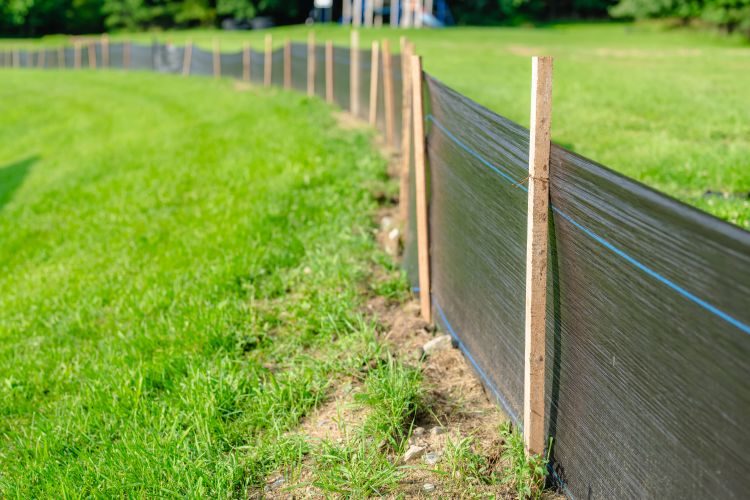 Silt Fence fabric with wooden posts