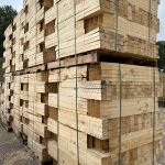 Wooden concrete stakes stacked on pallets