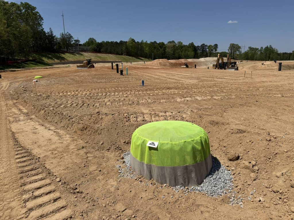 Silt Saver frame and filter assembly installed on a graded construction pad